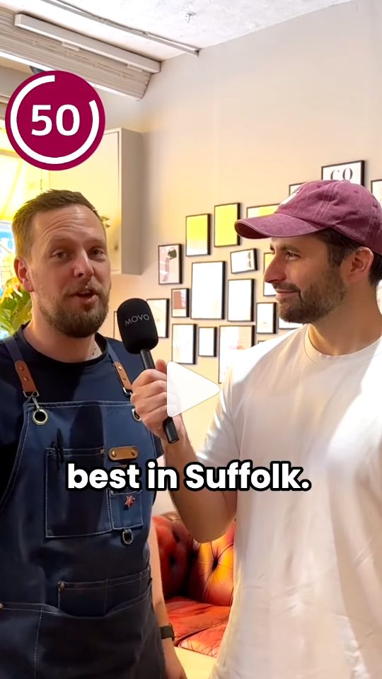Jacob interviewing a café owner